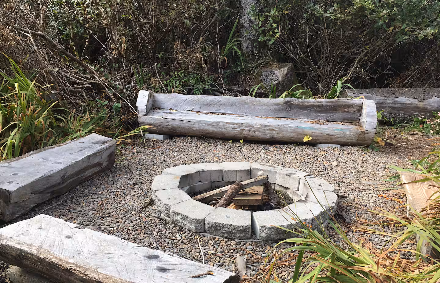 Outdoor fire pit on the south side of the house